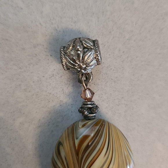 Oval Shaped Beige Pendant with Swirl Detailing - Picture 7 of 8